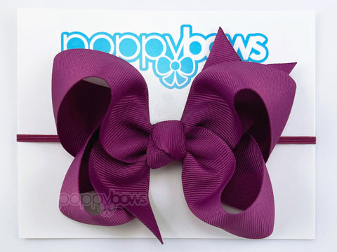 magenta baby headband with bow