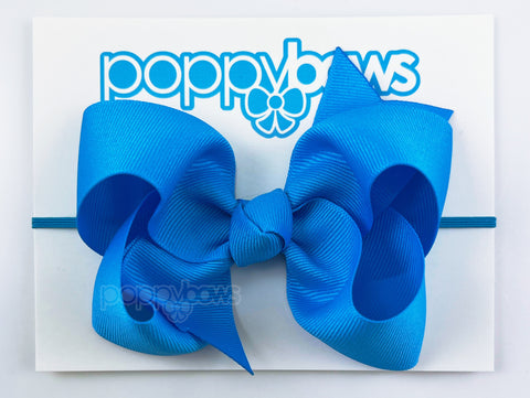 baby headband with bow in bright blue