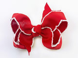 red and white moonstitch hair bow for baby girl