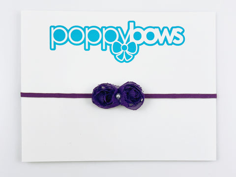 baby headband with small flower in dark purple, newborn preemie