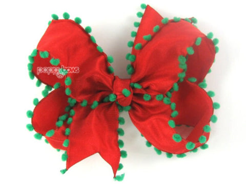 red and green pom pom girls hair bow on clip