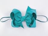 ocean teal blue baby girls elastic headband with bow
