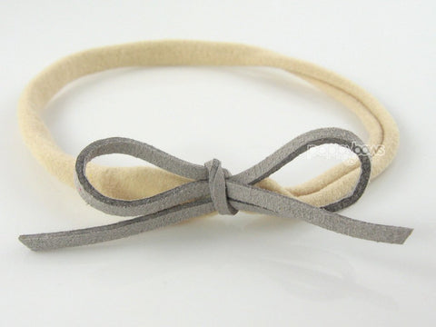 gray baby girls bow headband in suede and nylon