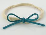 teal blue suede tie baby girls bow headband on nylon