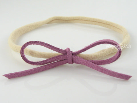 purple suede bow baby headband on nylon