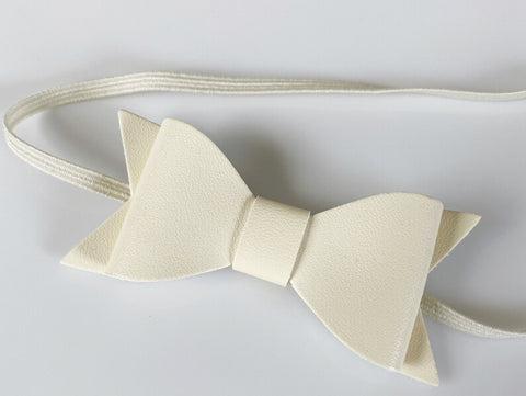 ivory cream baby bow headband in faux leather