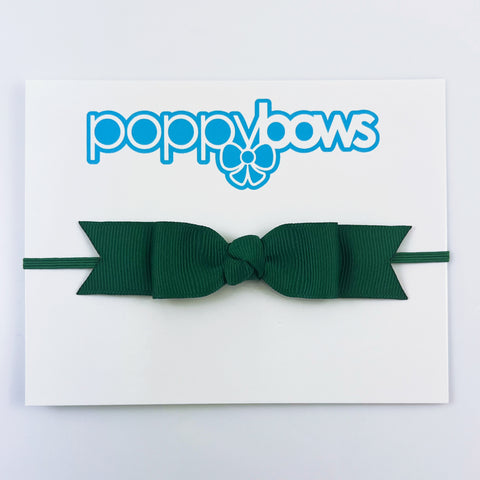 dark green hunter baby bow headband on elastic