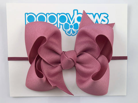 mauve pink baby girl bow headband on elastic