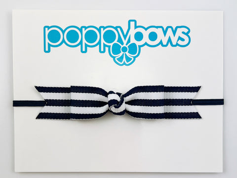 navy blue and white striped baby girl headband with long bow on elastic