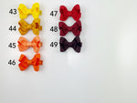 yellow red and orange hair bows