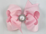 pink hair bow with pearl bling