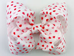 Valentine's Day Hair Bow in white with red and pink mini hearts