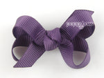 purple baby hair bow on clip for newborn infant