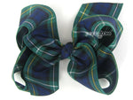 Campbell tartan girls hair bow in navy blue, dark green, yellow, and white school plaid