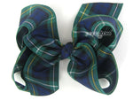 Campbell tartan girls hair bow in navy blue, dark green, yellow, and white school plaid