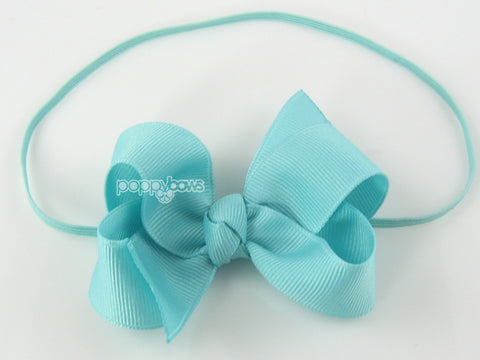 aqua blue baby girl bow headband on elastic