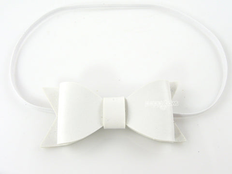 white baby bow headband in faux leather