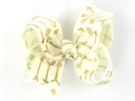 ivory and gold baby girl 3 inch hair bow