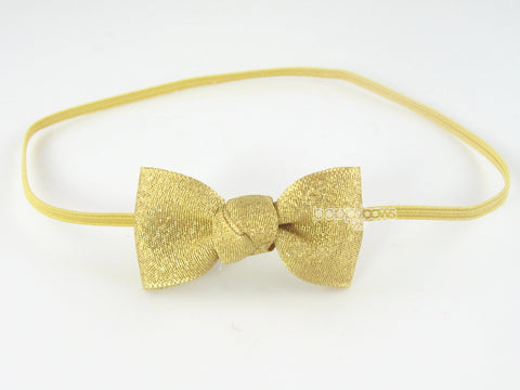 gold baby girl headband with extra small bow