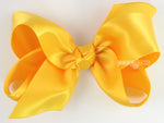 golden yellow satin hair bow