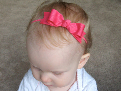 pink baby headband with long bow on elastic