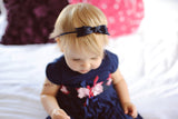 navy blue baby girl headband with long bow on elastic
