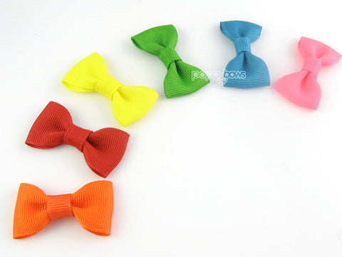 baby hair bows in bright colors by poppybows