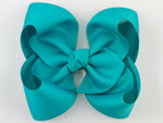 girls hair bows, baby hair bows, cute hair bows, large hair bows, big hair bows, fine hair,  thick hair, clips with teeth, barrettes with teeth, hair clips, hair accessories, girls hair accessories, boutique, hairbows, boutique bows, boutique hair bows, handmade hair bows, solid color, basic hair bows, barrettes with ribbon bows, non slip, grosgrain ribbon, 5 inch, 5.5 inch, 6 inch 5”, 2 1/4” wide ribbon, extra wide ribbon, knot, knotted center, caribbean blue, ocean blue, aqua, tropical blue