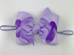 light purple baby bow girl's headband on elastic