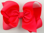 neon pink hair bow