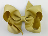 yellow gold hair bow