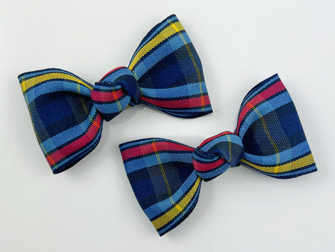 school plaid hair bows in navy blue, light blue, red, and yellow