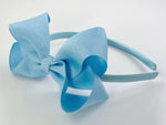 big girls headbands, hard headbands, lined headbands with bows, back to school headbands, headbands with bows for girls, school headbands, bow headbands u shaped plastic band, grosgrain ribbon bow headbands toddlers big girls 4” 4 inch big large bow, light blue, classic baby blue