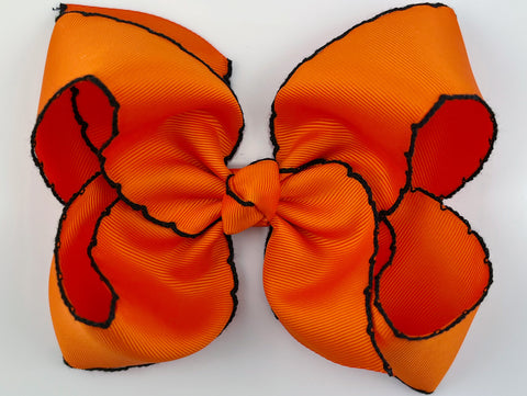 Halloween hair bow for girls in orange and black