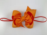 orange baby bow 4 inch elastic headband