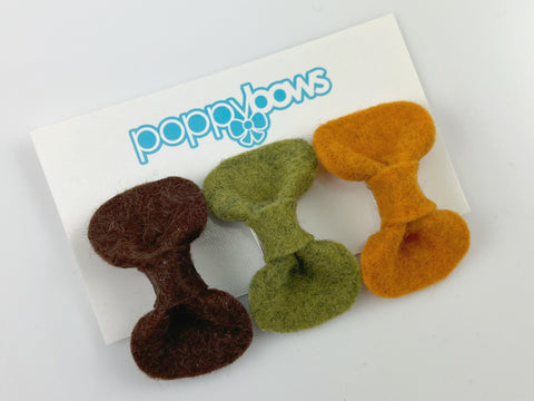 wool felt baby hair clips in brown, olive green, and pumpkin spice fall colors