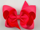 neon pink hair bow
