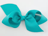 bright teal blue hair bow for baby girl