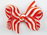 orange and white striped hair bow