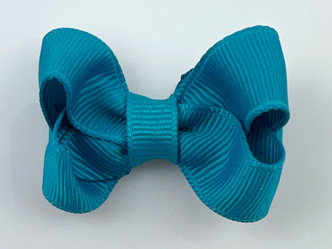 small 2 inch hair bow in teal blue for baby girls