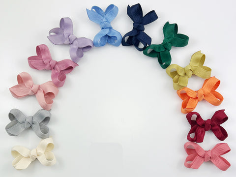 baby hair bows / smallest newborn infant size bows on mini snap barrette clips